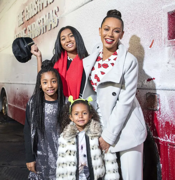 Mel B and Family Boarding the Christmas Bus at Sheperd’s Bush